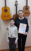 Лауреат конкурса и преподаватель